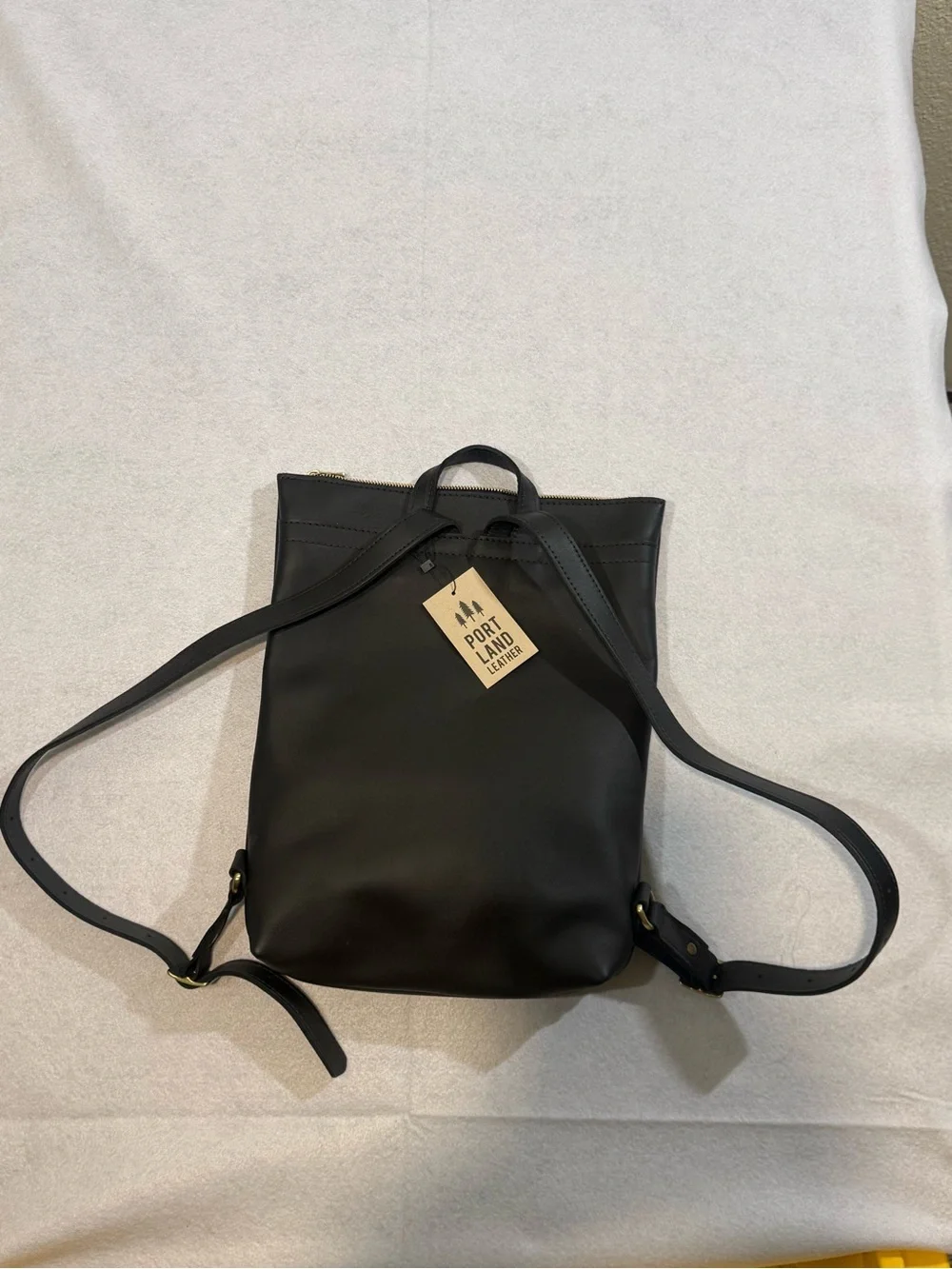 Portland Leather Laptop Backpack Leather Black With Gold Front Zip Pocket